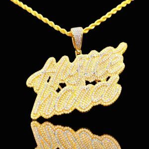 New Icy Supreme Quality 14K Bi-Color Gold Finish Hustle Hard Pendant over Brass.